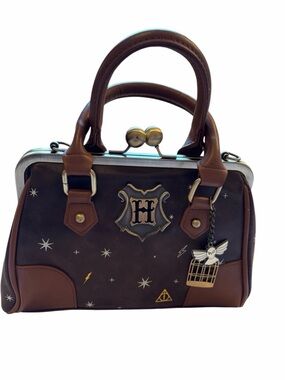 Harry Potter Celestial Kiss Lock Handbag/ gold star and lightning bolt details.